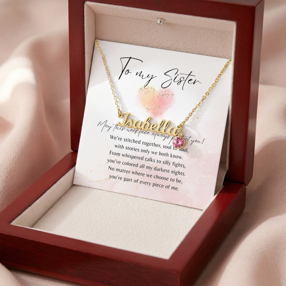 Custom Name Necklace with Birthstone for Sister – A Meaningful Gift of Sisterhood | gold finish necklace with personalized name and pink stone in gift box