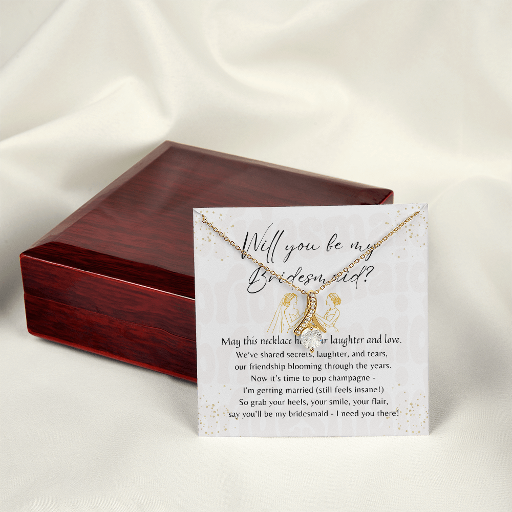 Alluring Beauty Necklace for Bridesmaid – A Meaningful Bridesmaid Proposal Gift with gold pendant and gift box on white fabric background