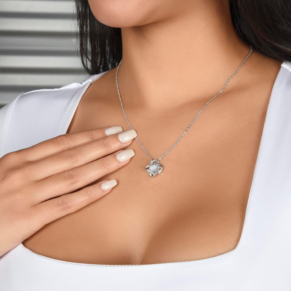 Woman wearing Love Knot Necklace for Myself – A thoughtful Gift to Myself | 14k White Gold or 18k Yellow Gold Plated pendant on silver chain