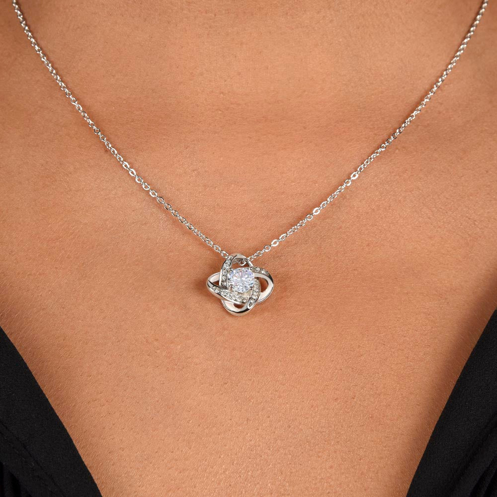 Love Knot Necklace for Grandma – A Meaningful Gift for Grandma | 14K White Gold or 18K Yellow Gold Plated worn on model with black top