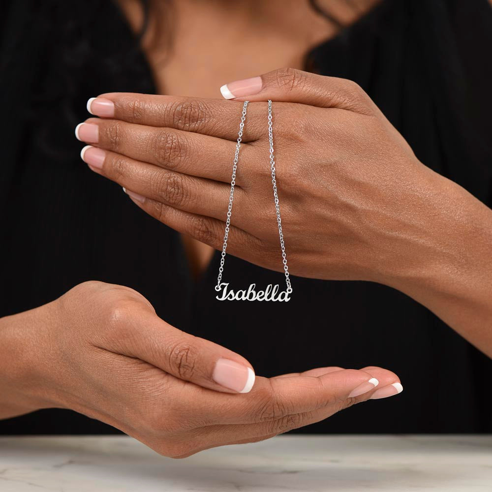 Custom Name Necklace for Mom Memorial – A Meaningful Memorial Gift in Loving Memory of Mom | Silver finish held between hands with black background