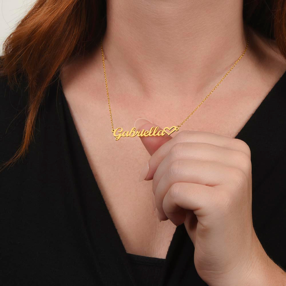 Heart Name Necklace for Myself – A Meaningful Gift for Yourself | delicate gold finish name necklace with heart detail worn on neck