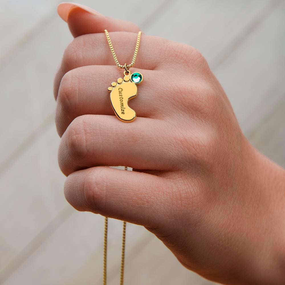 Personalized Engraved Baby Feet Necklace with Birthstone for New Mom – A Meaningful Gift for a New Mom | Stainless Steel or 18k Yellow Gold Finish held in hand