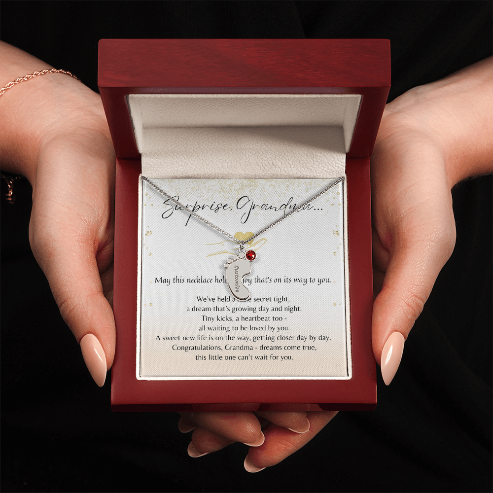 Personalized Engraved Baby Feet Necklace with Birthstone for Grandma-to-Be (1–4 Charms) – A Meaningful Pregnancy Announcement Gift for Grandma-to-Be | Stainless displayed in gift box held by hands with poem card inside