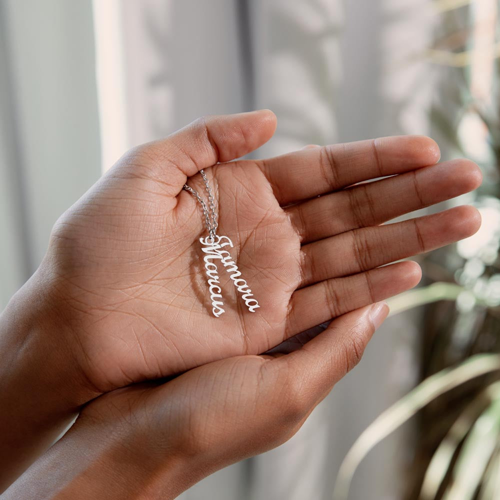 Vertical Multiple Name Necklace for Mom (1–4 Charms) – A Meaningful Gift of Love | silver stainless steel necklace held in hand with two name charms