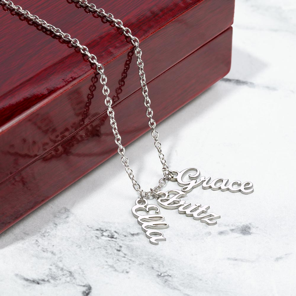 Vertical Multiple Name Necklace for Mom (1–4 Charms) – A Meaningful Gift of Love | silver chain necklace with three name charms displayed on marble surface
