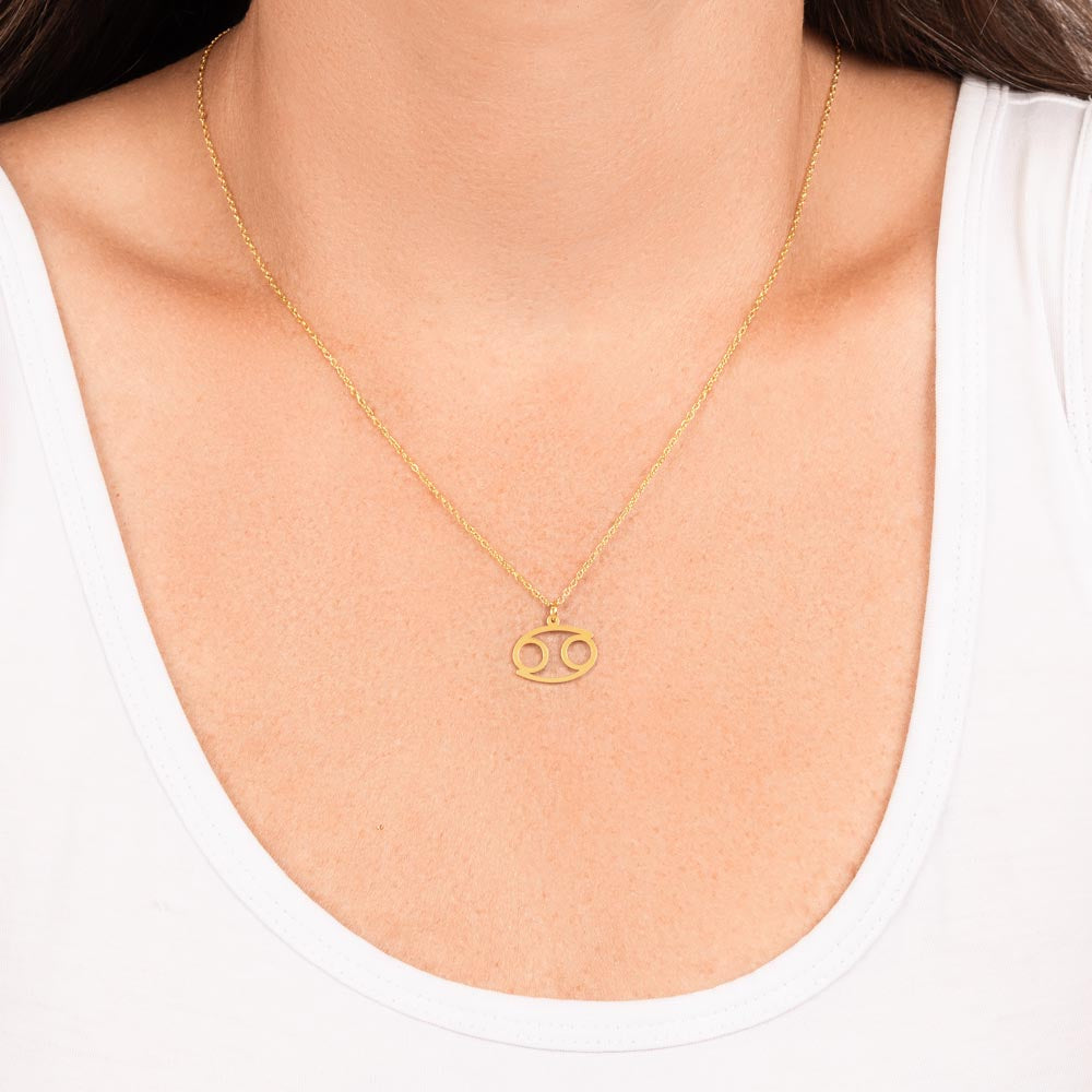 Cancer Zodiac Symbol Necklace for Girls – A Meaningful Gift for a Cancer Girl | Stainless Steel or 18k Yellow Gold Finish worn on model's neck