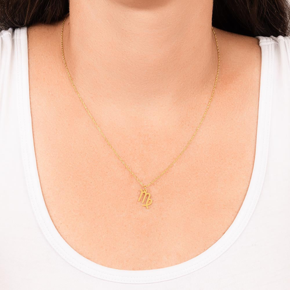 Virgo Zodiac Necklace for Women – Astrology Gift with delicate gold symbol pendant worn on simple chain against white top