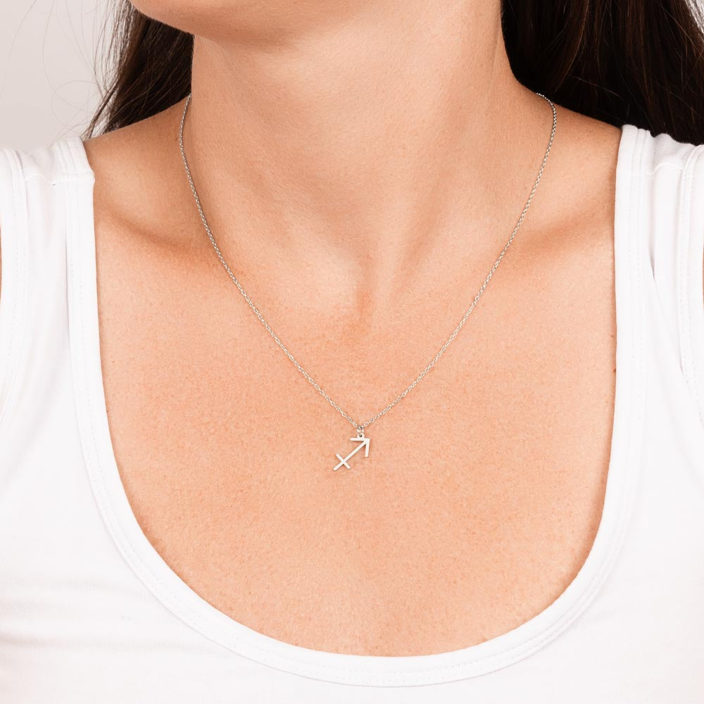 Sagittarius Zodiac Symbol Necklace for Girls – A Meaningful Gift for a Sagittarius Girl | Stainless Steel or 18k Yellow Gold Finish worn on model's neck