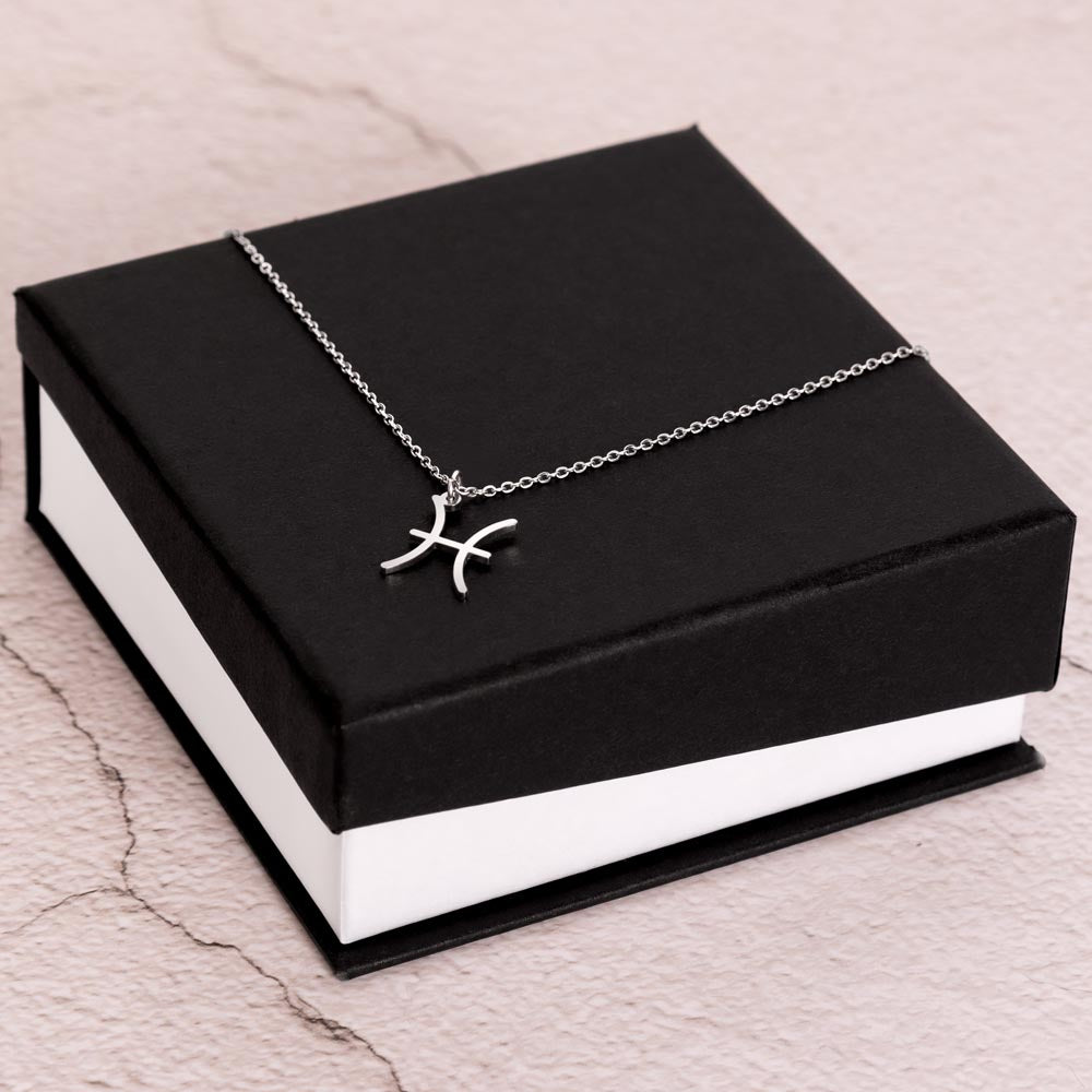 Pisces Zodiac Symbol Necklace for Girls – A Meaningful Gift for a Pisces Girl | Stainless Steel or 18k Yellow Gold Finish displayed on black and white gift box