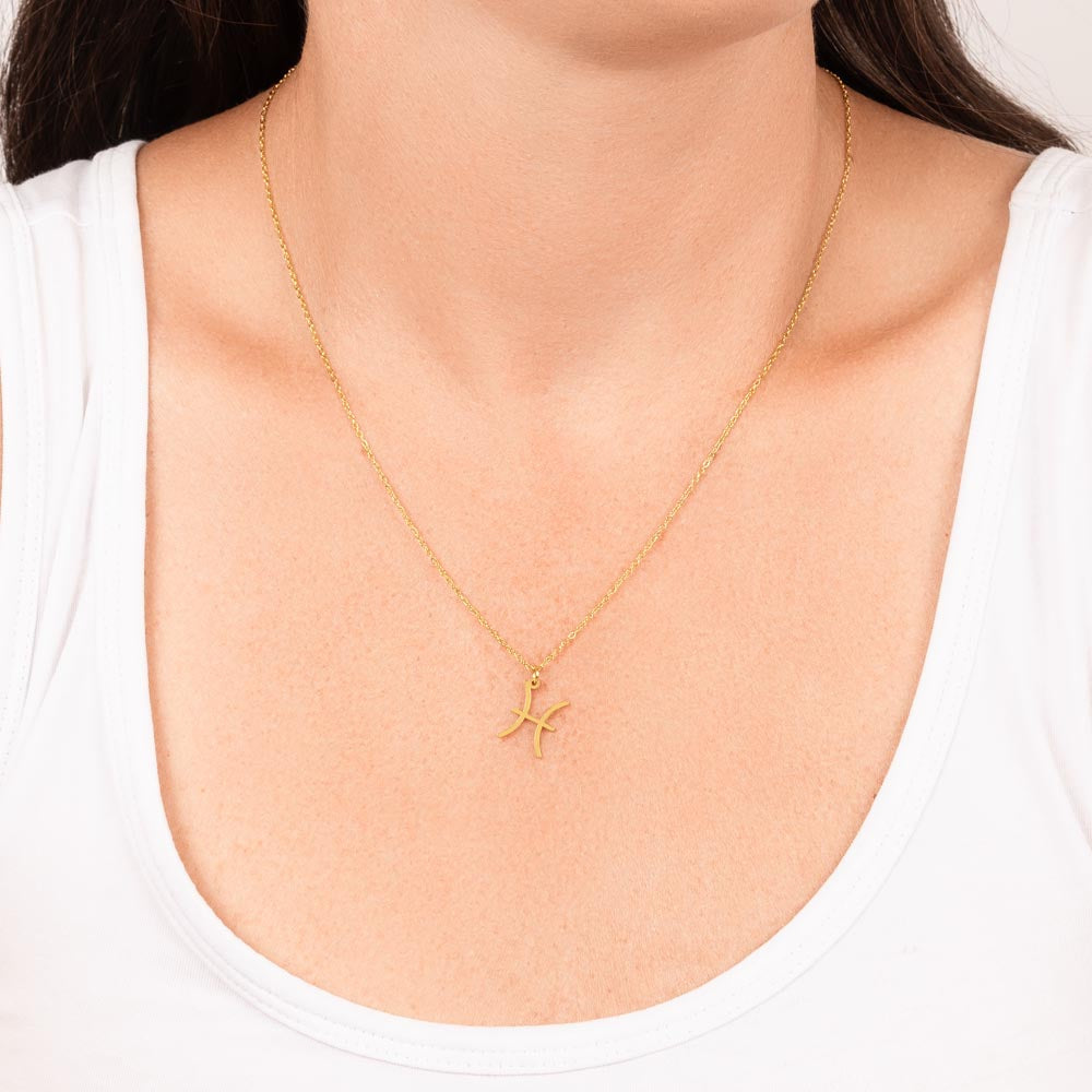Pisces Zodiac Symbol Necklace for Girls – A Meaningful Gift for a Pisces Girl | Stainless Steel or 18k Yellow Gold Finish worn on a model's neck