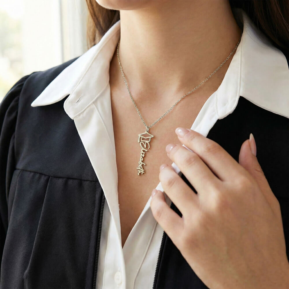 Custom Graduation Cap Name Necklace for Graduate – Personalized Graduation Gift worn with white collared shirt and black gown